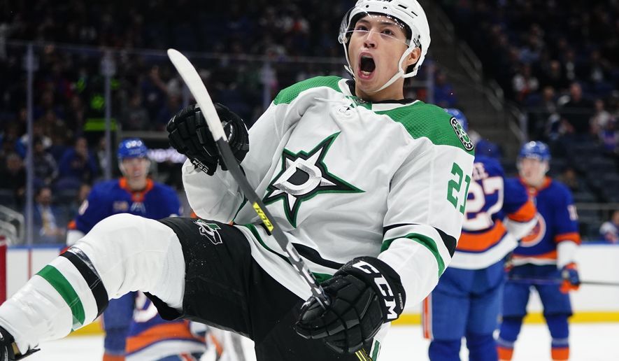 Dallas Stars&#x27; Jason Robertson celebrates after scoring a goal during the first period of an NHL hockey game against the New York Islanders Tuesday, Jan. 10, 2023, in Elmont, N.Y. (AP Photo/Frank Franklin II)