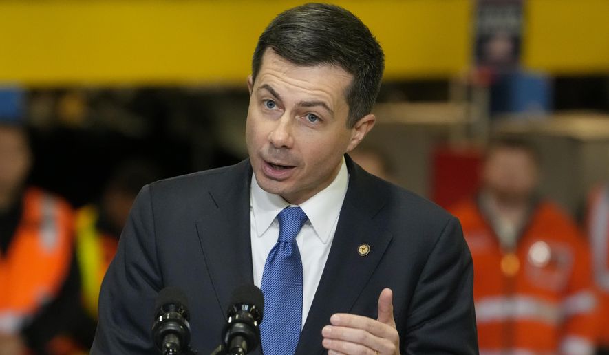 Transportation Secretary Pete Buttigieg speaks before the arrival of President Joe Biden at the construction site of the Hudson Tunnel Project, Tuesday, Jan. 31, 2023, in New York. Nearly 50 businesses and nonprofits including rideshare companies Uber and Lyft, industrial giant 3M and automaker Honda are pledging millions of dollars in initiatives to stem a &quot;crisis&quot; in road fatalities under a new federal effort announced Friday, Feb. 3. (AP Photo/John Minchillo)