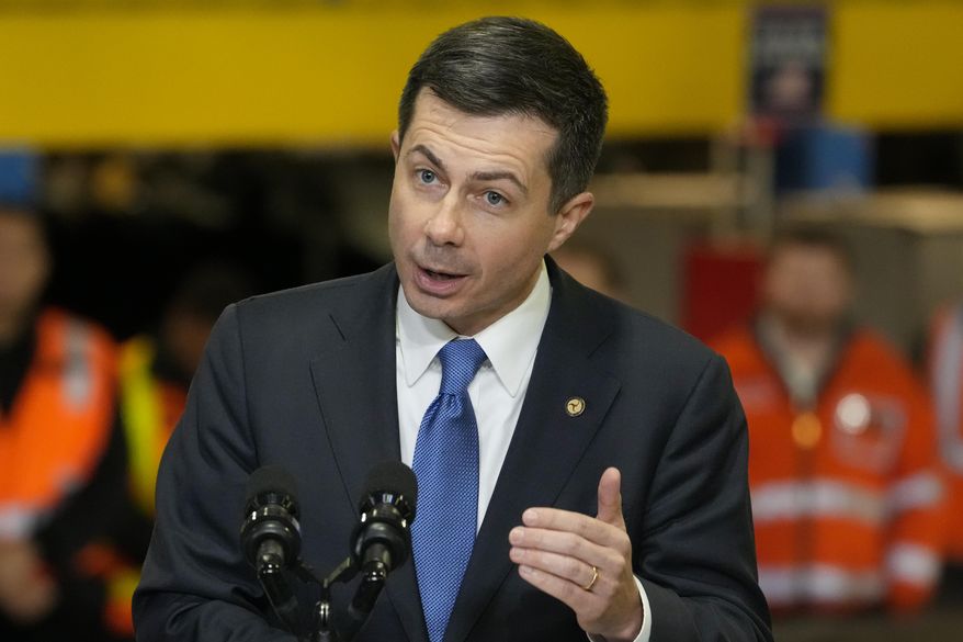 Transportation Secretary Pete Buttigieg speaks before the arrival of President Joe Biden at the construction site of the Hudson Tunnel Project, Tuesday, Jan. 31, 2023, in New York. Nearly 50 businesses and nonprofits including rideshare companies Uber and Lyft, industrial giant 3M and automaker Honda are pledging millions of dollars in initiatives to stem a &quot;crisis&quot; in road fatalities under a new federal effort announced Friday, Feb. 3. (AP Photo/John Minchillo)