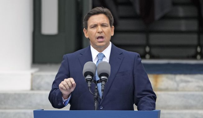 Florida Gov. Ron DeSantis speaks after being sworn in to begin his second term during an inauguration ceremony outside the Old Capitol Jan. 3, 2023, in Tallahassee, Fla. Florida lawmakers will meet Monday, Feb. 6, 2023, to complete a state takeover Walt Disney World&#x27;s self-governing district and debate proposals on immigration and election crimes, as DeSantis continues to leverage national political fissures ahead of an expected White House run. (AP Photo/Lynne Sladky, File)