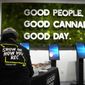 Assistant manager Mandy Gratz arranges a display at Good Day Farm dispensary Friday, Feb. 3, 2023, in St. Louis. Recreational marijuana sales were allowed to begin on Friday in Missouri after the state&#39;s health department gave approval. (AP Photo/Jeff Roberson)