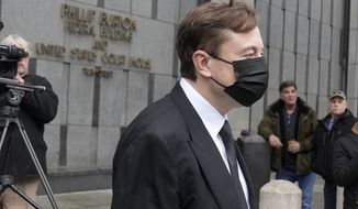 Elon Musk leaves a federal courthouse in San Francisco, Friday, Feb. 3, 2023. A high-profile trial focused on a 2018 tweet about the financing for a Tesla buyout that never happened drew a surprise spectator for Friday&#39;s final arguments — Musk, the billionaire who is being accused of misleading investors with his usage of the Twitter service he now owns. (AP Photo/Jeff Chiu)
