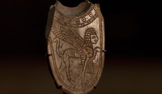 A 2,700-year-old ivory incense spoon plundered from a site in the occupied West Bank — seized in late 2021 by the Manhattan District Attorney&#39;s office as part of a plea deal with billionaire hedge fund manager Michael Steinhardt, displayed at the Palestinian Ministry of Tourism and Antiquities in the West Bank city of Bethlehem, Thursday, Jan. 19, 2023. Earlier this month, American officials handed over the artifact to the Palestinians in what the U.S. State Department&#39;s Office of Palestinian Affairs said was &quot;the first event event of such repatriation&quot; by the U.S. to the Palestinians. (AP Photo/ Maya Alleruzzo)
