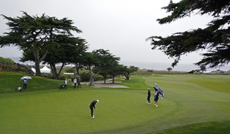 Viktor Hovland, of Norway, putts on the 10th green of the Monterey Peninsula Country Club Shore Course during the second round of the AT&amp;T Pebble Beach Pro-Am golf tournament in Pebble Beach, Calif., Friday, Feb. 3, 2023. (AP Photo/Eric Risberg)