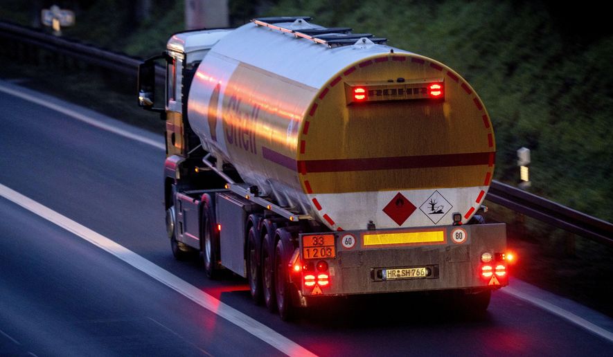 A fuel truck drives along a highway in Frankfurt, Germany, Jan. 27, 2023. European Union governments tentatively agreed Friday, Feb. 3, 2023, to set a $100-per-barrel price cap on sales of Russian diesel to coincide with an EU embargo on the fuel — steps aimed at ending the bloc&#x27;s energy dependence on Russia and limiting the money Moscow makes to fund its war in Ukraine. (AP Photo/Michael Probst, File)
