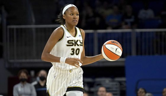 Chicago Sky&#x27;s Azura Stevens dribbles the ball during a WNBA basketball game against the Seattle Storm on July 20, 2022, in Chicago. Stevens is heading west, signing with the Los Angeles Sparks the team announced Friday, Feb. 3, 2023. (AP Photo/Charles Rex Arbogast, File)