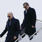 President Joe Biden and his son Hunter Biden step off Air Force One, Saturday, Feb. 4, 2023, at Hancock Field Air National Guard Base in Syracuse, N.Y. The Bidens are in Syracuse to visit with family members following the passing of Michael Hunter, the brother of the president&#39;s first wife, Neilia Hunter Biden. (AP Photo/Patrick Semansky)