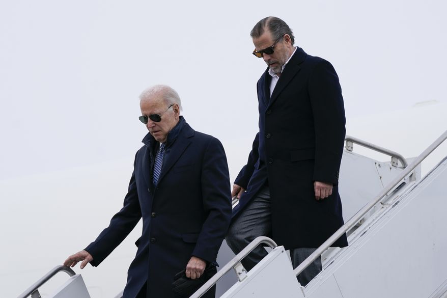 President Joe Biden and his son Hunter Biden step off Air Force One, Saturday, Feb. 4, 2023, at Hancock Field Air National Guard Base in Syracuse, N.Y. The Bidens are in Syracuse to visit with family members following the passing of Michael Hunter, the brother of the president&#x27;s first wife, Neilia Hunter Biden. (AP Photo/Patrick Semansky)