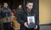 Soldiers and friends carry a coffin of Eduard Lobau, a Belarusian volunteer soldier who was killed defending Donetsk region, in Kyiv, Ukraine, Saturday, Feb. 4, 2023. Eduard Lobau, a Belarusian who had been fighting for Ukraine since 2015, died from a shrapnel wound while hunting tanks with a Javelin. He is now at least the 15th Belarusian to have fallen fighting for Ukraine in the last year. (AP Photo/Efrem Lukatsky)