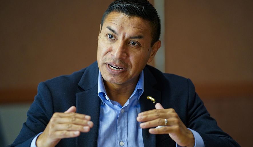 Then-Republican candidate for Indiana Secretary of State Diego Morales speaks during an interview in Indianapolis, Sept. 20, 2022. Republicans in a handful of red states won their campaigns for secretary of state last year after claiming they would make sweeping changes to keep fraud out of elections. So far, their efforts to make good on their promises are a mixed bag – in part because they face opposition from lawmakers in their own party. (AP Photo/Michael Conroy)