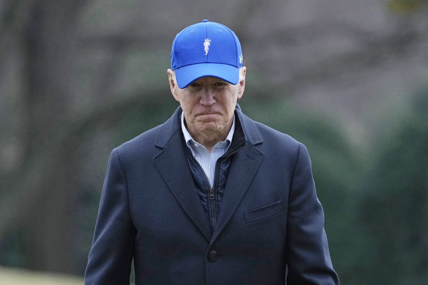 President Joe Biden walks off of Marine One on the South Lawn of the White House in Washington, Monday, Feb. 6, 2023, after returning from a weekend at Camp David in Maryland. (AP Photo/Susan Walsh)