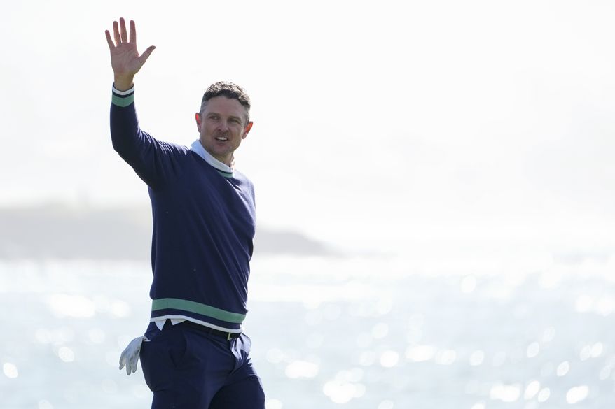 Justin Rose, of England, reacts after making a par putt on the 18th green of the Pebble Beach Golf Links to win the AT&amp;T Pebble Beach Pro-Am golf tournament in Pebble Beach, Calif., Monday, Feb. 6, 2023. (AP Photo/Godofredo A. Vásquez)