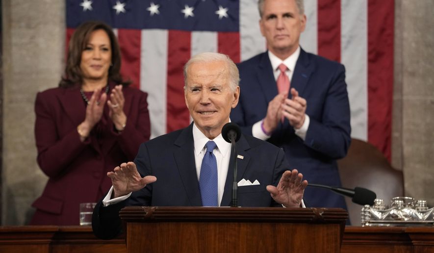 President Joe Biden delivers the State of the Union address to a joint session of Congress at the U.S. Capitol, Tuesday, Feb. 7, 2023, in Washington, as Vice President Kamala Harris and House Speaker Kevin McCarthy of Calif., applaud. (AP Photo/Jacquelyn Martin, Pool)
