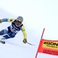Ukraine&#39;s Ivan Kovbasnyuk speeds down the course during the super G portion of an alpine ski, men&#39;s World Championship combined race, in Courchevel, France, Tuesday, Feb. 7, 2023. (AP Photo/Gabriele Facciotti)