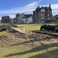 Construction continues to restore the area around the Swilcan Bridge on the 18th hole of the Old Course at St. Andrews on Tuesday, Feb. 7, 2023, from St Andrews, Scotland. What was shaping up as one the biggest controversies in golf this year also turned out to be the shortest one. The outrage began with social media images of the St. Andrews Links Trust extending the start of the bridge to include a circular patio of stones that did not look like they had been there for 700 years. (Sadie Golen via AP)
