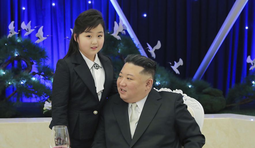 In this photo provided by the North Korean government, North Korean leader Kim Jong-un and his daughter attend a feast to mark the 75th founding anniversary of the Korean People’s Army at an unspecified place in North Korea Tuesday, Feb. 7, 2023. Independent journalists were not given access to cover the event depicted in this image distributed by the North Korean government. The content of this image is as provided and cannot be independently verified. Korean language watermark on image as provided by source reads: &quot;KCNA&quot; which is the abbreviation for Korean Central News Agency. (Korean Central News Agency/Korea News Service via AP)