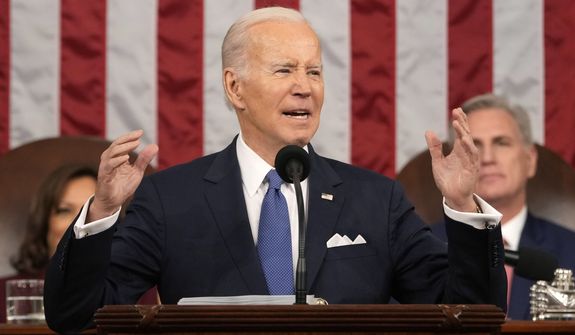 President Joe Biden delivers the State of the Union address to a joint session of Congress at the U.S. Capitol, Tuesday, Feb. 7, 2023, in Washington, as Vice President Kamala Harris and House Speaker Kevin McCarthy of Calif., listen. (AP Photo/Jacquelyn Martin, Pool)