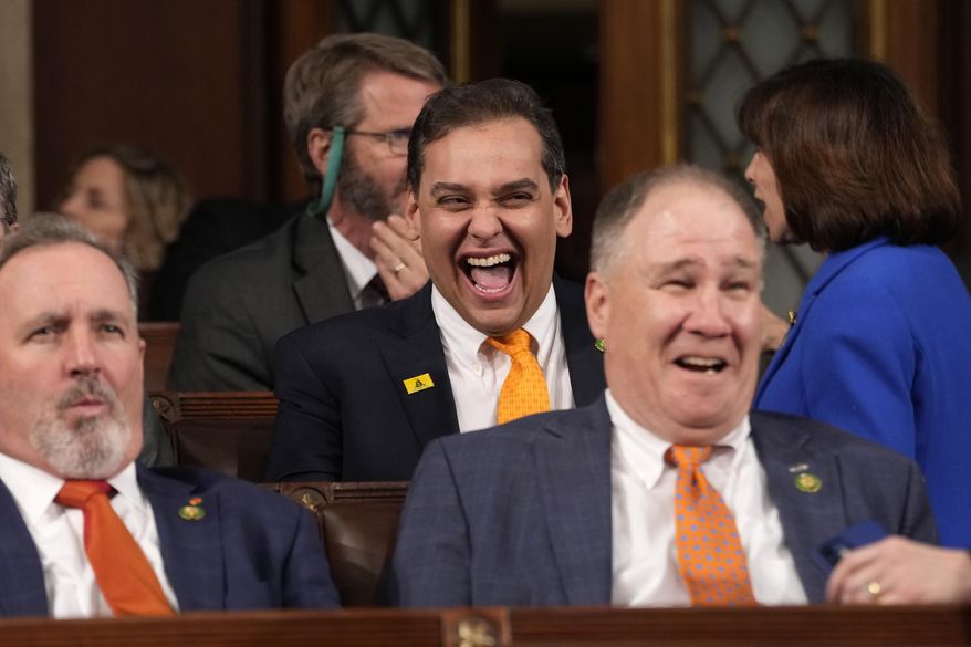Rep. George Santos, R-N.Y., laughs b before President Joe Biden delivers the State of the Union address to a joint session of Congress at the U.S. Capitol, Tuesday, Feb. 7, 2023, in Washington.(AP Photo/Jacquelyn Martin, Pool)