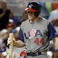 United States&#39; Paul Goldschmidt (44) walks off after striking out during a first-round game of the World Baseball Classic against the Dominican Republic, on March 11, 2017, in Miami. Major League Baseball’s new pitch clock, limits on shifts and larger bases will not be used during the World Baseball Classic. The three innovations will be debuted during the spring training exhibition season that starts Feb. 24. The 20-team national team tournament runs from March 8-21, and players will return to their clubs for more exhibition games with the new rules ahead of opening day on March 30. (AP Photo/Lynne Sladky, File0 **FILE**