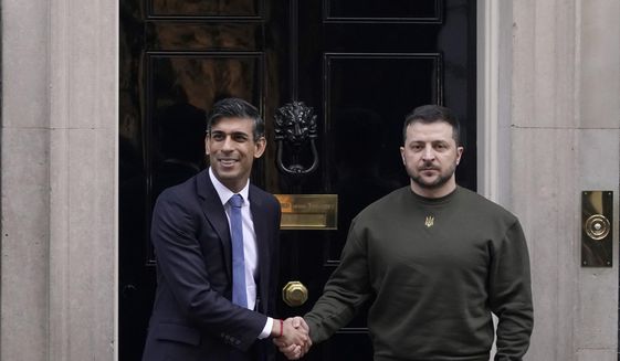 Britain&#x27;s Prime Minister Rishi Sunak, left, welcomes Ukraine&#x27;s President Volodymyr Zelenskyy at Downing Street in London, Wednesday, Feb. 8, 2023. It is the first visit to the UK by the Ukraine President since the war began nearly a year ago. (AP Photo/Alberto Pezzali)