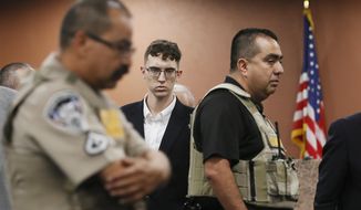 El Paso Walmart shooting suspect Patrick Crusius pleads not guilty during his arraignment on Oct. 10, 2019, in El Paso, Texas. Crusius accused of killing nearly two dozen people in a racist attack at a Texas Walmart plans to plead guilty to federal charges in the case. That&#x27;s according to court records filed days after the federal government said it wouldn’t seek the death penalty in the case. In a court filing Saturday, Jan. 21, 2023, defense attorneys asked for a hearing to be set so Crusius could plead guilty to federal charges.(Briana Sanchez / El Paso Times via AP, Pool, File)