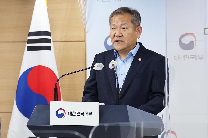 Lee Sang-min, Minister of the Interior and Safety, center, speaks at the government complex in Seoul, South Korea, Thursday, Oct. 6, 2022. South Korea’s opposition-controlled parliament on Wednesday, Feb. 8, 2023, voted to impeach Lee, him responsible for government failures in disaster planning and the response that likely contributed to the high death toll of a crowd crush that killed nearly 160 people in October. (Kim Seung-doo/Yonhap via AP)