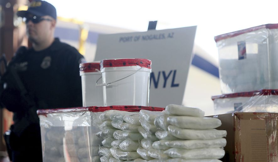 A display of the fentanyl and meth that was seized by U.S. Customs and Border Protection officers at the Nogales Port of Entry is shown during a press conference, Jan. 31, 2019, in Nogales, Ariz. (Mamta Popat/Arizona Daily Star via AP) **FILE**