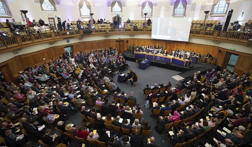 Members of the Church of England&#x27;s Synod, gather at the General Synod of the Church of England, at Church House in central London, to consider a motion which reviews the church&#x27;s failure &quot;to be welcoming to LGBTQI+ people&quot; and the harm they have faced and still experience, in London, Thursday, Feb. 9, 2023. (James Manning/PA via AP)