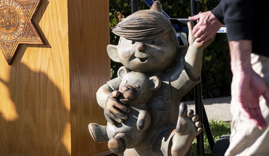Monterey's Dennis the Menace statue on display during a news conference where is was announced it was recovered Wednesday, Feb. 8, 2023, from Roberts Lake in Seaside. The statue of the comic strip character Dennis the Menace that was stolen from a park in Monterey, Calif., last summer was found submerged in a nearby lake. (Tess Kenny/Monterey Herald via AP)