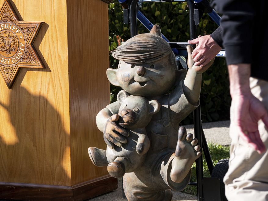 Monterey's Dennis the Menace statue on display during a news conference where is was announced it was recovered Wednesday, Feb. 8, 2023, from Roberts Lake in Seaside. The statue of the comic strip character Dennis the Menace that was stolen from a park in Monterey, Calif., last summer was found submerged in a nearby lake. (Tess Kenny/Monterey Herald via AP)
