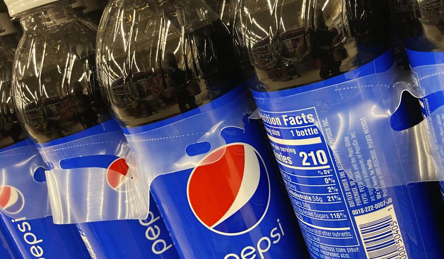 Bottles of Pepsi are displayed in a grocery store, Ill., Thursday, Feb. 10, 2022. PepsiCo reports their corporate results on Thursday, Feb. 9, 2023.  (AP Photo/Nam Y. Huh)
