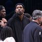 Brooklyn Nets forward Kevin Durant, center, looks on from the bench during the second half of an NBA basketball game against the Los Angeles Lakers, Monday, Jan. 30, 2023, in New York. (AP Photo/Corey Sipkin) **FILE**