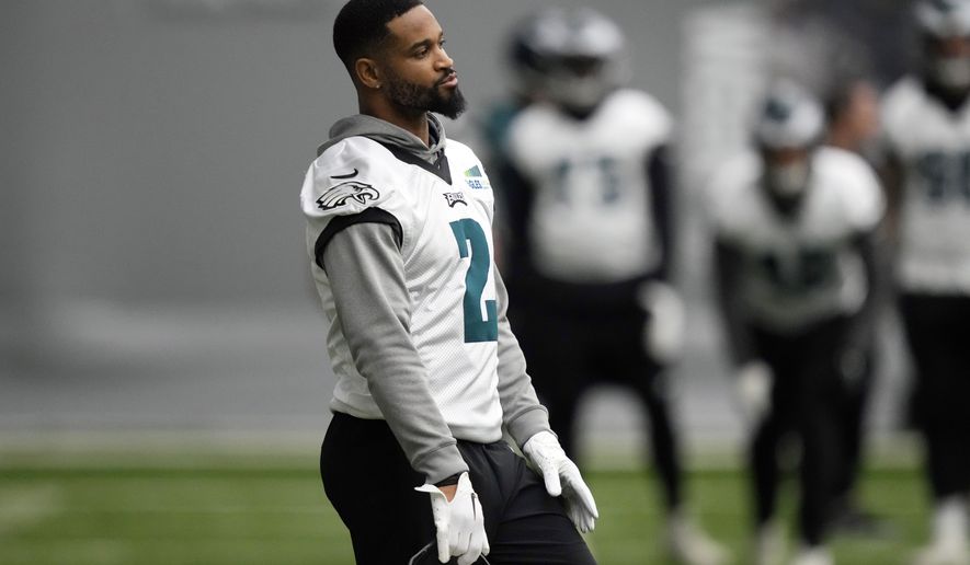 Philadelphia Eagles&#x27; Darius Slay watches practice at the NFL football team&#x27;s training facility, Friday, Feb. 3, 2023, in Philadelphia. The Eagles are scheduled to play the Kansas City Chiefs in Super Bowl LVII on Sunday, Feb. 12, 2023. (AP Photo/Matt Slocum)