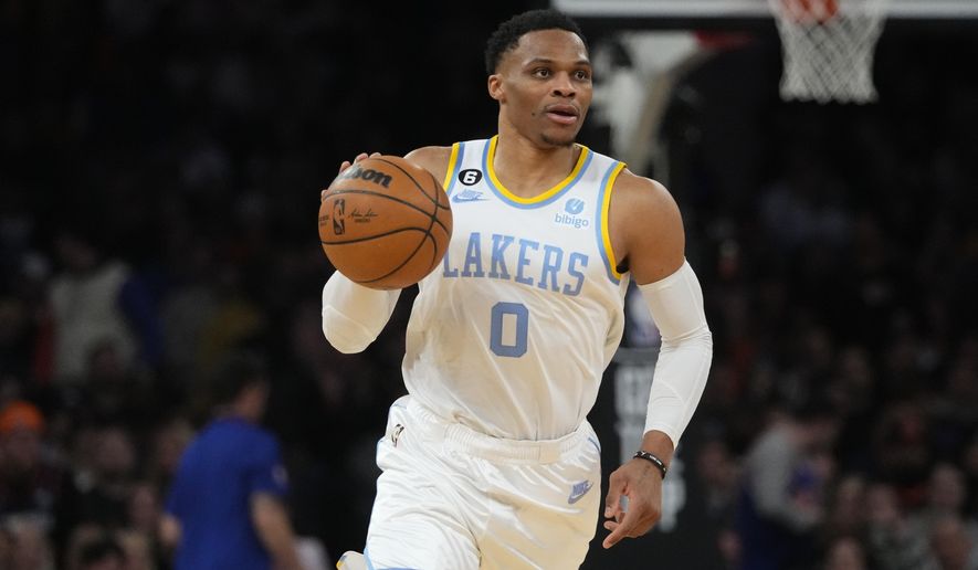 Los Angeles Lakers&#x27; Russell Westbrook brings the ball up during the second half of the team&#x27;s NBA basketball game against the New York Knicks on Jan. 31, 2023, in New York. The Lakers traded Westbrook to the Utah Jazz and reacquired guard D&#x27;Angelo Russell from Minnesota in a three-team, eight-player deal Wednesday night, Feb. 8, ahead of the NBA&#x27;s trade deadline, a person with knowledge of the trade told The Associated Press. (AP Photo/Frank Franklin II, File) **FILE**