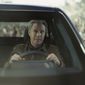 This photo provided by Netflix/GM, Will Ferrell drives a GMC Sierra EV Denali as he is chased by zombies from Netflix&#x27;s Army of the Dead from a scene from Netflix/GM 2023 Super Bowl NFL football spot. ( Netflix/GM via AP)