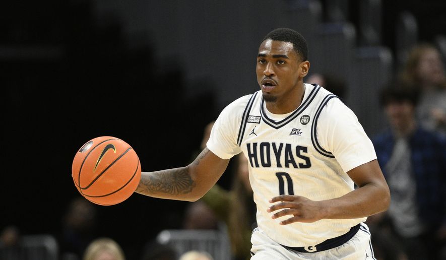 Georgetown guard Brandon Murray (0) in action during the second half of an NCAA college basketball game against Marquette, Saturday, Feb. 11, 2023, in Washington. (AP Photo/Nick Wass) **FILE**