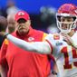 Kansas City Chiefs quarterback Patrick Mahomes (15) warms up as head coach Andy Reid looks on before the NFL Super Bowl 57 football game between the Kansas City Chiefs and the Philadelphia Eagles, Sunday, Feb. 12, 2023, in Glendale, Ariz. (AP Photo/Ross D. Franklin) **FILE**