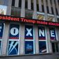 A headline about President Donald Trump is shown outside Fox News studios, Nov. 28, 2018, in New York. (AP Photo/Mark Lennihan, File)