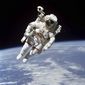 This Feb. 7, 1984 photo made available by NASA shows astronaut Bruce McCandless II, participating in a spacewalk a few meters away from the cabin of the Earth-orbiting space shuttle Challenger, using a nitrogen-propelled Manned Maneuvering Unit. The Johnson Space Center says McCandless died Thursday, Dec. 21, 2017 in California. (NASA via AP)