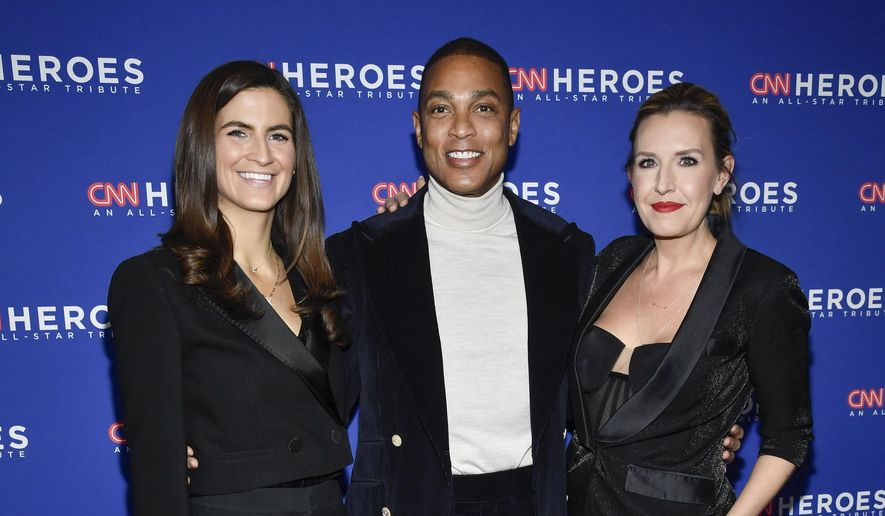 CNN anchors Kaitlan Collins, from left, Don Lemon and Poppy Harlow appear at the 16th annual CNN Heroes All-Star Tribute on Dec. 11, 2022, in New York. (Photo by Evan Agostini/Invision/AP, File)