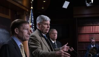 From left, Sen. Richard Blumenthal, D-Conn., Sen. Sheldon Whitehouse, D-R.I., and Sen. Lindsey Graham, R-S.C., call for legislation labeling the Russian Wagner Group as a foreign terrorist organization, during a news conference at the Capitol in Washington, Thursday, Feb. 16, 2023. The three lawmakers, all members of the Senate Judiciary Committee, are heading to Germany to attend the Munich Security Conference amid fears of a new Russian offensive against Ukraine. (AP Photo/J. Scott Applewhite)