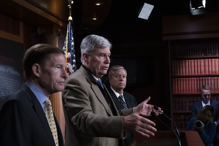 From left, Sen. Richard Blumenthal, D-Conn., Sen. Sheldon Whitehouse, D-R.I., and Sen. Lindsey Graham, R-S.C., call for legislation labeling the Russian Wagner Group as a foreign terrorist organization, during a news conference at the Capitol in Washington, Thursday, Feb. 16, 2023. The three lawmakers, all members of the Senate Judiciary Committee, are heading to Germany to attend the Munich Security Conference amid fears of a new Russian offensive against Ukraine. (AP Photo/J. Scott Applewhite)