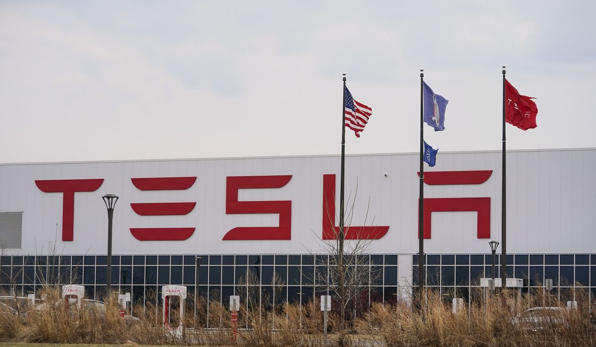 NextImg:Tesla fires dozens of workers amid unionization move