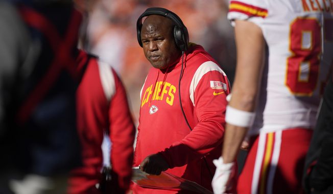 Kansas City Chiefs offensive coordinator Eric Bieniemy watches during the first half of the team&#x27;s NFL football game against the Denver Broncos on Dec. 11, 2022, in Denver. Bieniemy is finalizing terms to become the Washington Commanders&#x27; offensive coordinator and assistant head coach, according to a person with knowledge of the situation. The person spoke to The Associated Press on condition of anonymity Friday, Feb. 17, because the deal was not yet completed. (AP Photo/David Zalubowski, File)