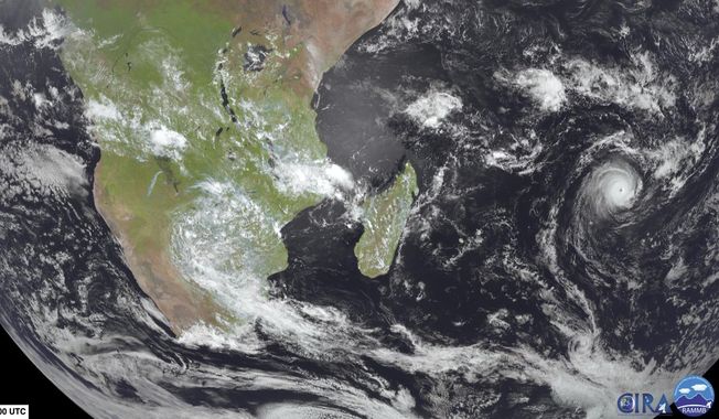 This image from Meteosat-9 satellite shows Cyclone Freddy, right, in the Indian Ocean near Madagascar, Friday, Feb. 17, 2023. Two weeks after Tropical Cyclone Cheneso devastated Madagascar, the Indian Ocean island nation and its neighbors are bracing for a more powerful Cyclone Freddy. (NOAA via AP)