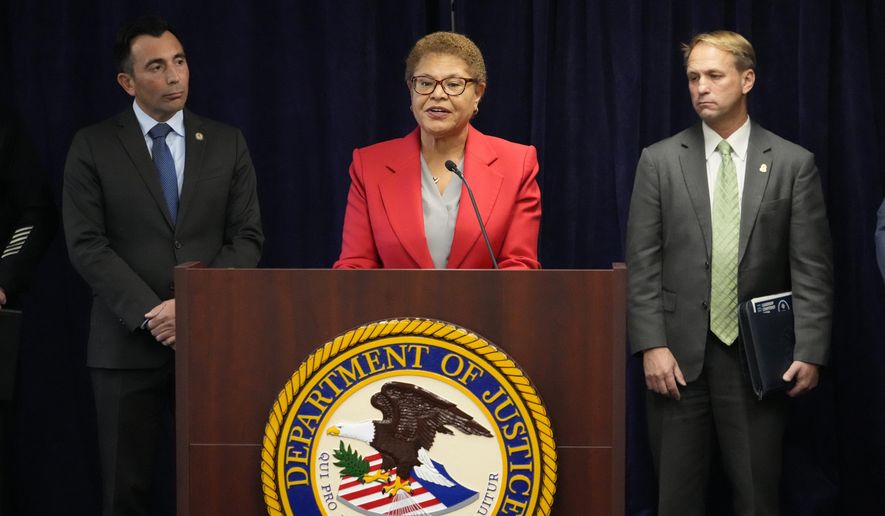 Los Angeles Mayor Karen Bass denounces anti-Semitism and hate crimes at a news conference at the U.S. Attorney's Office Central District of California offices in Los Angeles Friday, Feb. 17, 2023. At left, United States Attorney Martin Estrada and FBI Assistant Director in Charge Don Always, right. A person was taken into custody Thursday in connection with the shootings of two Jewish men outside synagogues in Los Angeles this week that investigators believe were hate crimes, police said. (AP Photo/Damian Dovarganes)