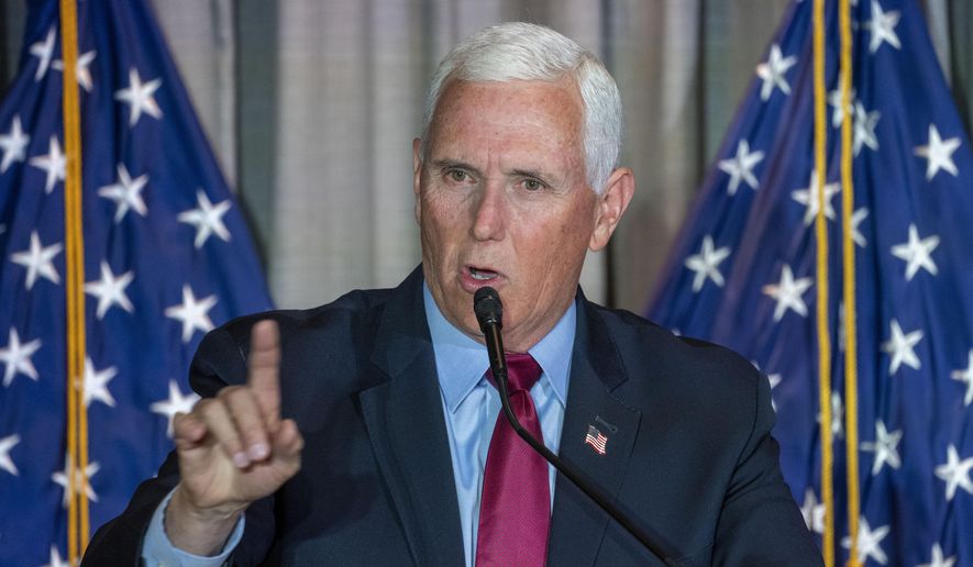 Former Vice President Mike Pence pauses while speaking at a Coolidge and the American Project luncheon in the Madison Building of the Library of Congress, Thursday, Feb. 16, 2023, in Washington. (AP Photo/Alex Brandon)