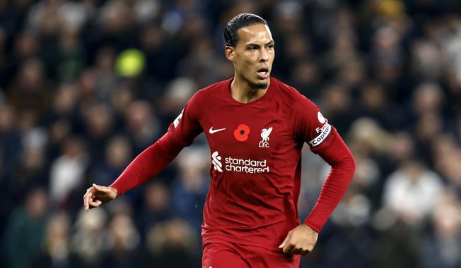 Liverpool&#x27;s Virgil van Dijk controls the ball during the English Premier League soccer match between Tottenham Hotspur and Liverpool at Tottenham Hotspur Stadium, in London, Sunday, Nov. 6, 2022. Liverpool center back Virgil van Dijk is on track to start at Newcastle on Saturday, Feb. 18, 2023, after sitting out for nearly six weeks with a hamstring injury. (AP Photo/David Cliff, File)