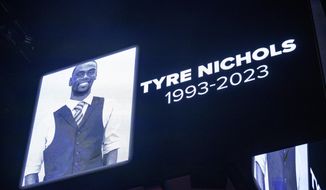 The screen at the Smoothie King Center in New Orleans honors Tyre Nichols before an NBA basketball game between the New Orleans Pelicans and the Washington Wizards, Jan. 28, 2023. Five former Memphis, Tenn., police officers were scheduled Friday, Feb. 17, to make their first court appearance on murder and other charges in the violent arrest and death of Nichols. (AP Photo/Matthew Hinton, File)