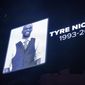 The screen at the Smoothie King Center in New Orleans honors Tyre Nichols before an NBA basketball game between the New Orleans Pelicans and the Washington Wizards, Jan. 28, 2023. Five former Memphis, Tenn., police officers were scheduled Friday, Feb. 17, to make their first court appearance on murder and other charges in the violent arrest and death of Nichols. (AP Photo/Matthew Hinton, File)